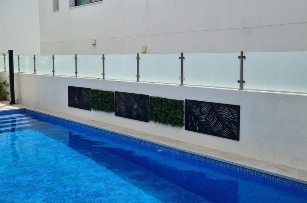 Balustrade fencing running alongside pool.